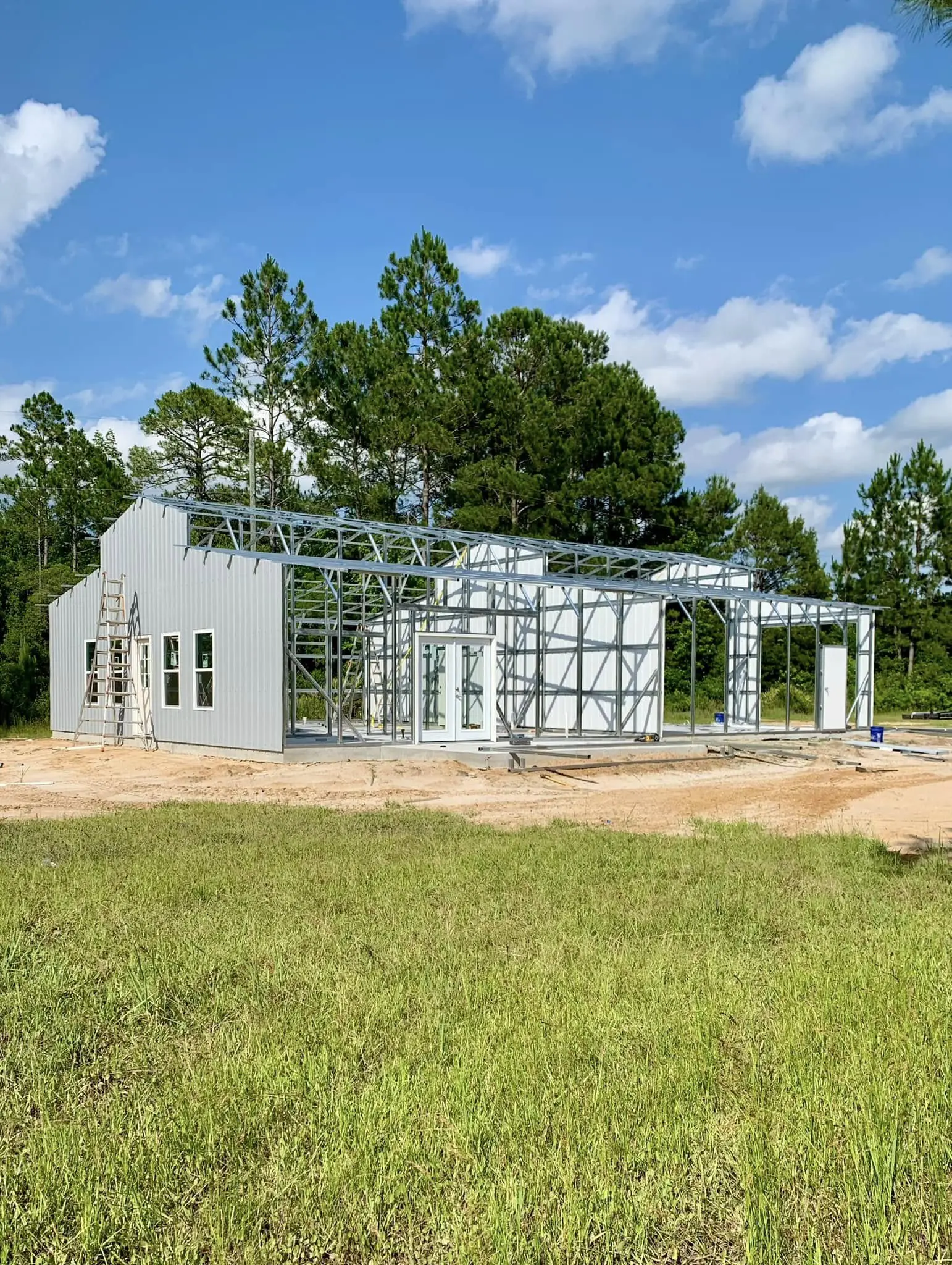 Steel building during frame and siding installation